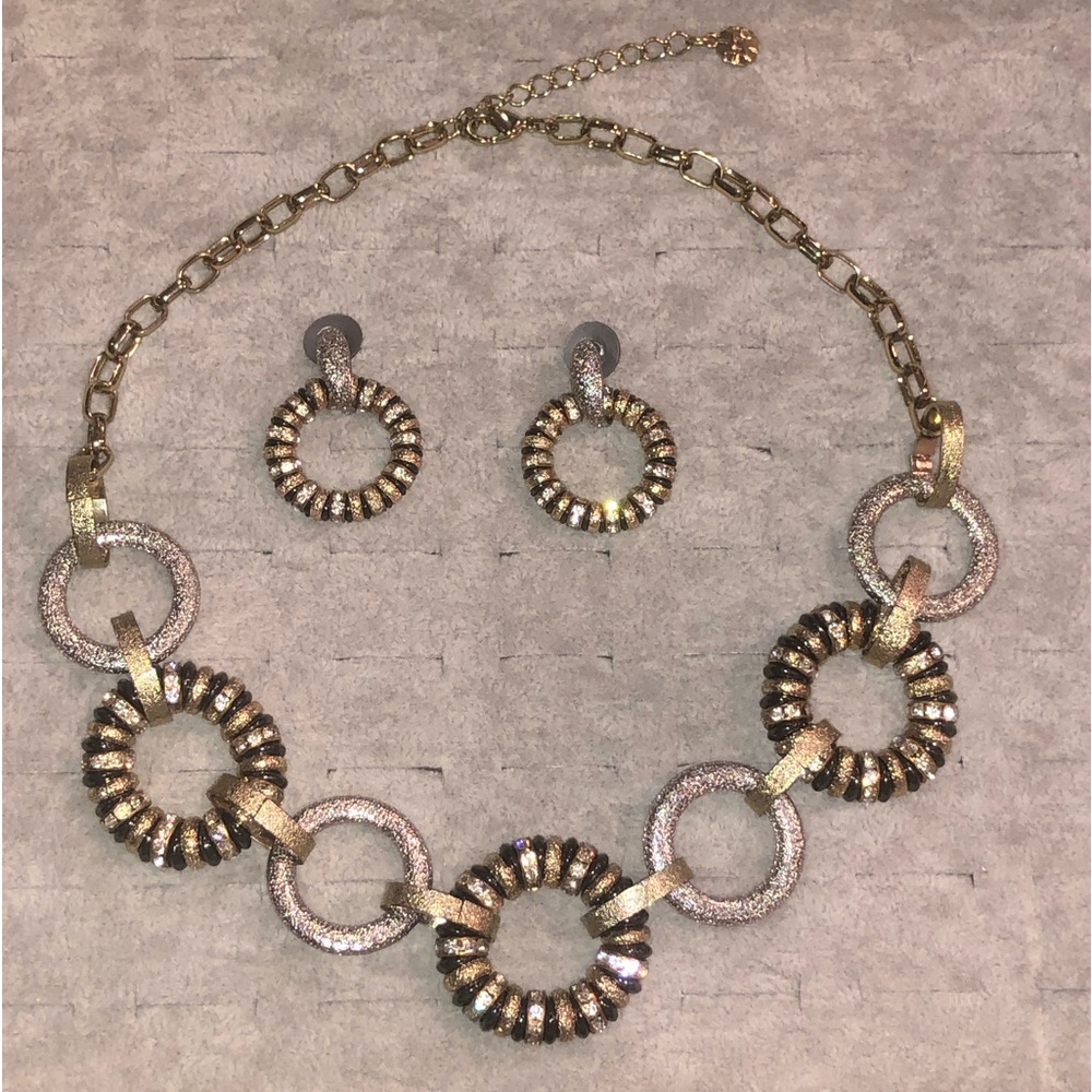 Monet Brand Jewelry: Necklace and Earrings Set with Embellished Rhinestones.